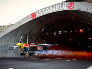 Red Bull pilot flies plane through tunnels, sets Guinness records